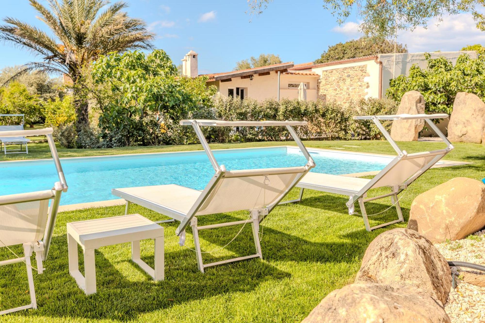 Stazzo San Teodoro Il Ginepro Piscina Condivisa Apartment ภายนอก รูปภาพ